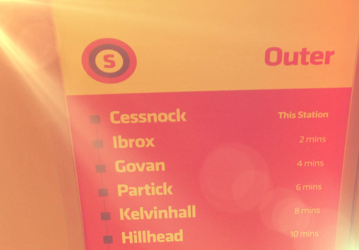A cropped shot of the Cessnock Outer Circle sign, showing the station names and journey times to each